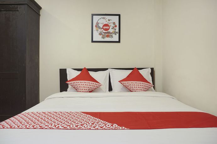 Imagen de la habitación del Hotel SUPER OYO 409 Pondok Helomi. Foto 7