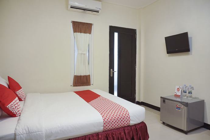Imagen de la habitación del Hotel SUPER OYO 409 Pondok Helomi. Foto 11