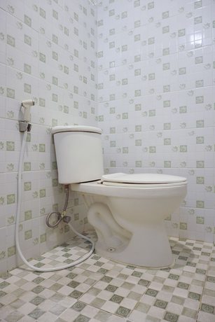 Imagen de la habitación del Hotel SUPER OYO 409 Pondok Helomi. Foto 12