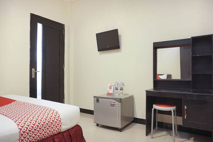 Imagen de la habitación del Hotel SUPER OYO 409 Pondok Helomi. Foto 15