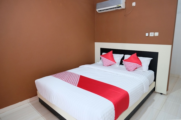 Imagen de la habitación del Hotel SUPER OYO 811 Mars Kost Syariah. Foto 3