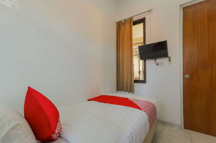 Imagen de la habitación del Hotel SUPER OYO 866 Idola Residence. Foto 2