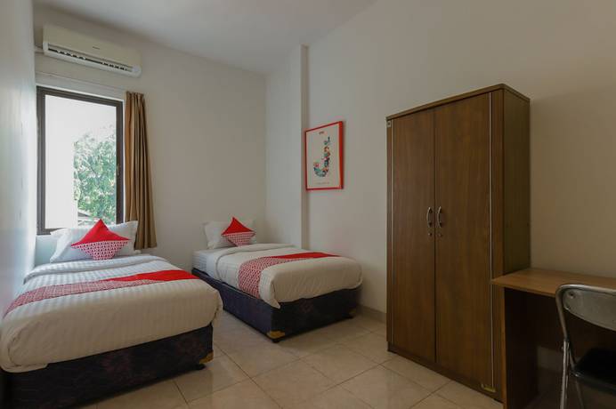 Imagen de la habitación del Hotel SUPER OYO 866 Idola Residence. Foto 3