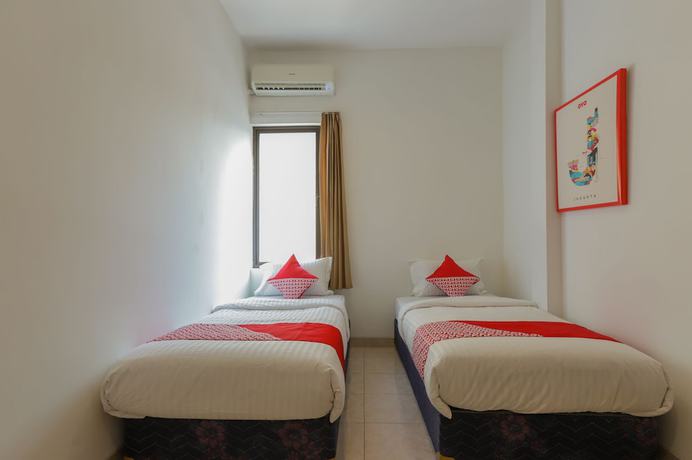 Imagen de la habitación del Hotel SUPER OYO 866 Idola Residence. Foto 5