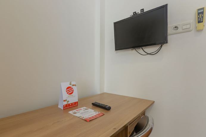 Imagen de la habitación del Hotel SUPER OYO 866 Idola Residence. Foto 6