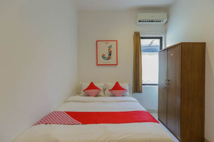 Imagen de la habitación del Hotel SUPER OYO 866 Idola Residence. Foto 7