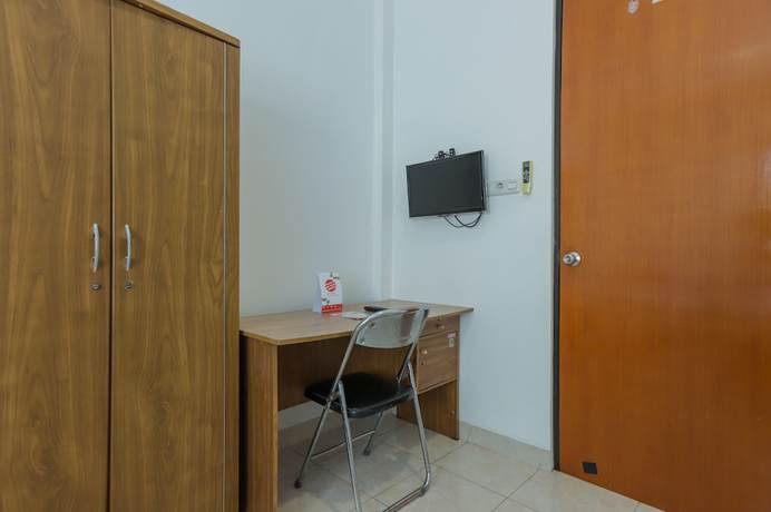 Imagen de la habitación del Hotel SUPER OYO 866 Idola Residence. Foto 11