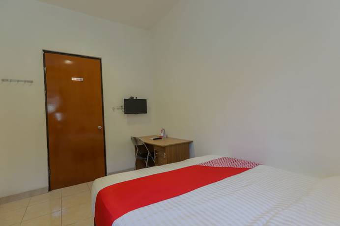 Imagen de la habitación del Hotel SUPER OYO 866 Idola Residence. Foto 15