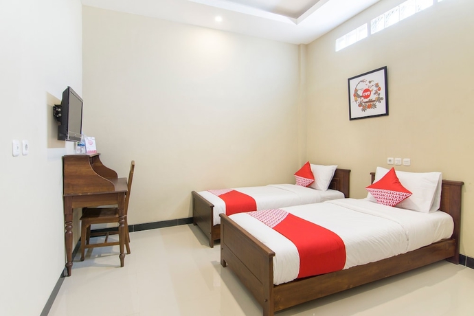Imagen de la habitación del Hotel SUPER OYO 890 Dewi Fortuna Guest House. Foto 3