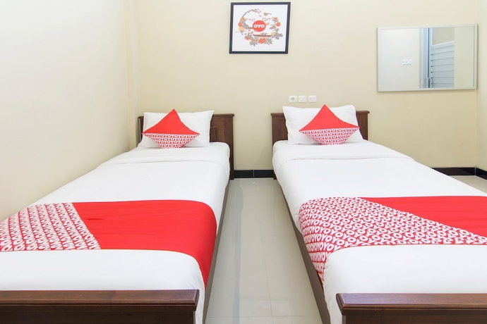 Imagen de la habitación del Hotel SUPER OYO 890 Dewi Fortuna Guest House. Foto 4