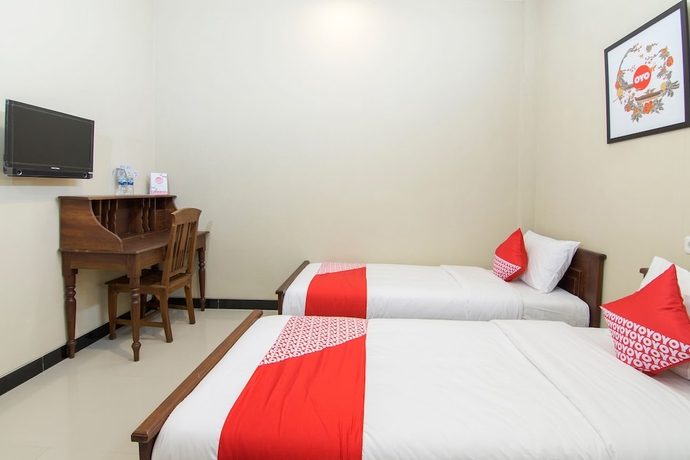 Imagen de la habitación del Hotel SUPER OYO 890 Dewi Fortuna Guest House. Foto 11