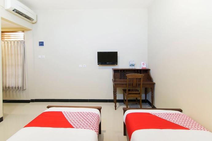 Imagen de la habitación del Hotel SUPER OYO 890 Dewi Fortuna Guest House. Foto 12