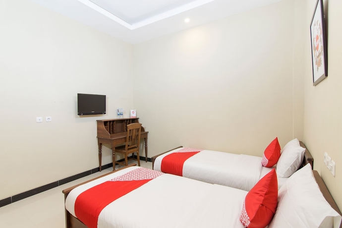 Imagen de la habitación del Hotel SUPER OYO 890 Dewi Fortuna Guest House. Foto 13