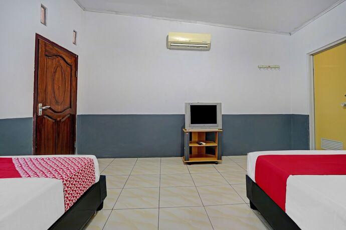 Imagen de la habitación del Hotel SUPER OYO 90405 Penginapan Sasti Kuningan. Foto 14