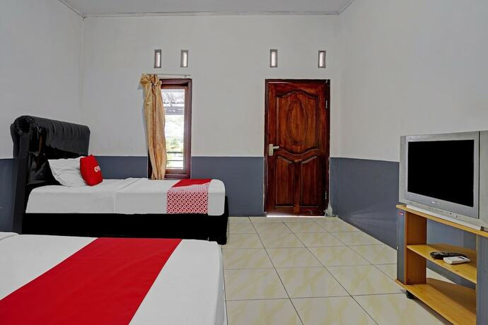 Imagen de la habitación del Hotel SUPER OYO 90405 Penginapan Sasti Kuningan. Foto 15