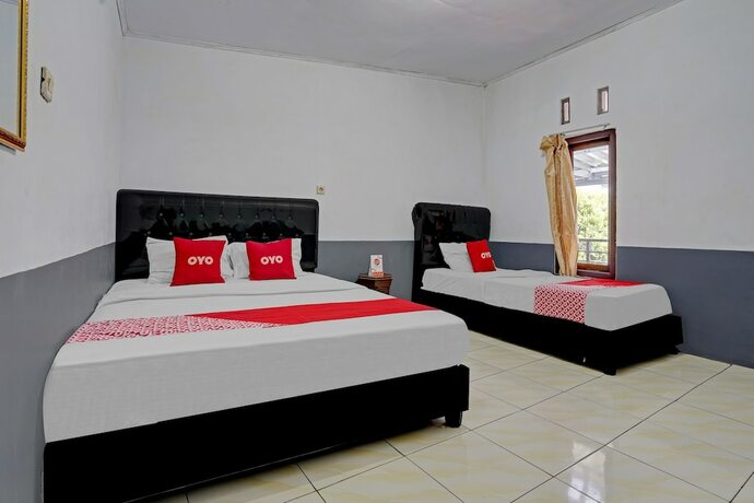 Imagen de la habitación del Hotel SUPER OYO 90405 Penginapan Sasti Kuningan. Foto 16