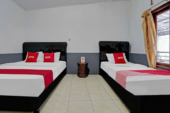 Imagen de la habitación del Hotel SUPER OYO 90405 Penginapan Sasti Kuningan. Foto 17