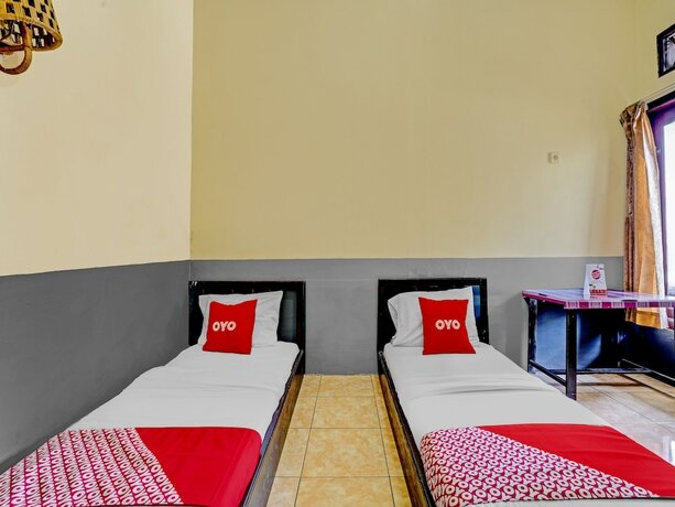 Imagen de la habitación del Hotel SUPER OYO 90405 Penginapan Sasti Kuningan. Foto 18