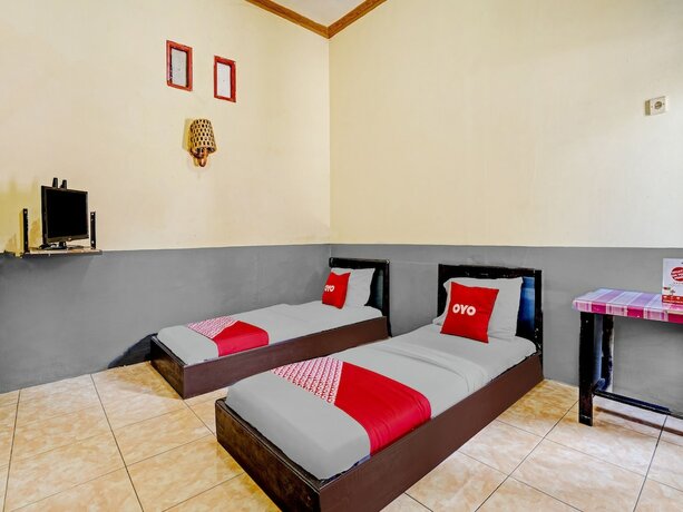 Imagen de la habitación del Hotel SUPER OYO 90405 Penginapan Sasti Kuningan. Foto 19