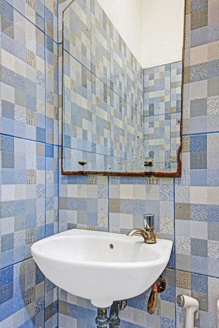 Imagen de la habitación del Hotel SUPER OYO 90422 Mall Of Indonesia. Foto 5