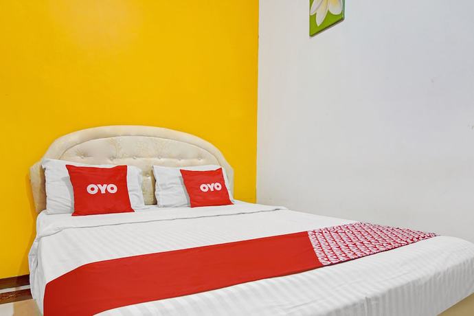 Imagen de la habitación del Hotel SUPER OYO 90422 Mall Of Indonesia. Foto 11