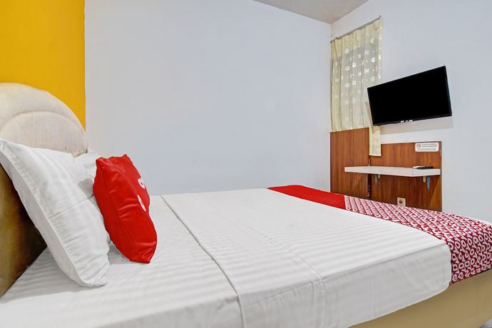 Imagen de la habitación del Hotel SUPER OYO 90422 Mall Of Indonesia. Foto 12