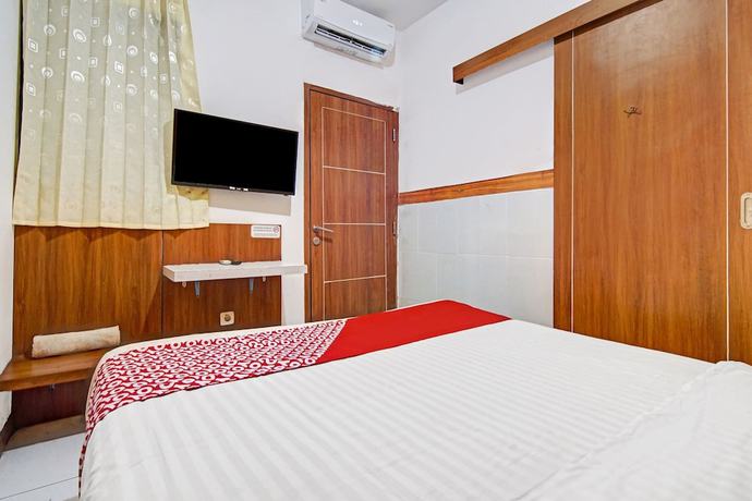 Imagen de la habitación del Hotel SUPER OYO 90422 Mall Of Indonesia. Foto 13