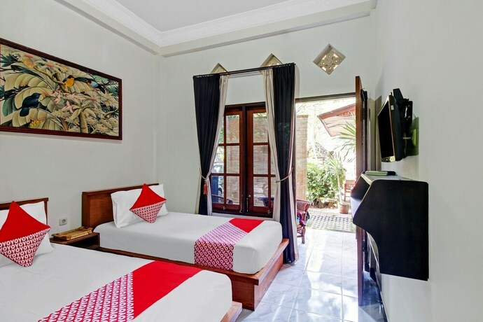 Imagen de la habitación del Hotel SUPER OYO 90672 Adhya Guest House Lombok. Foto 19