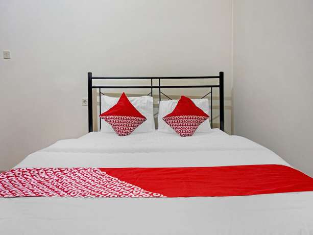 Imagen de la habitación del Hotel SUPER OYO 90689 Lily House. Foto 3