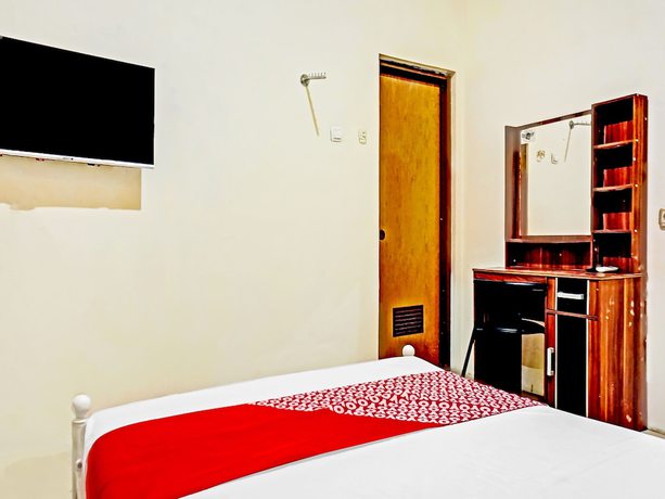 Imagen de la habitación del Hotel SUPER OYO 90689 Lily House. Foto 4