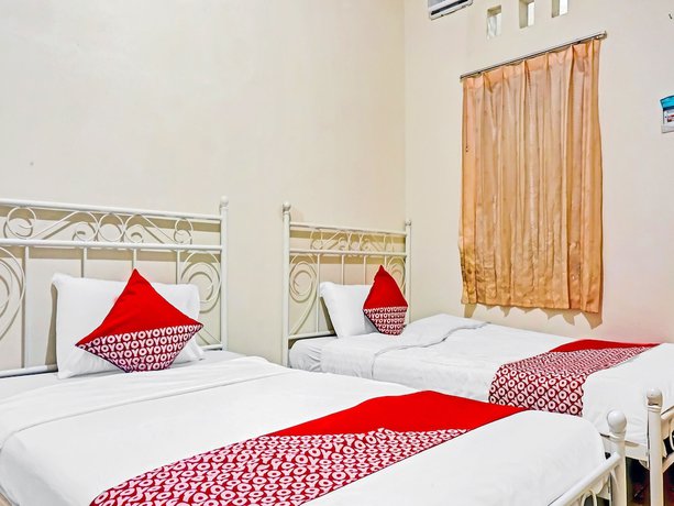 Imagen de la habitación del Hotel SUPER OYO 90689 Lily House. Foto 6