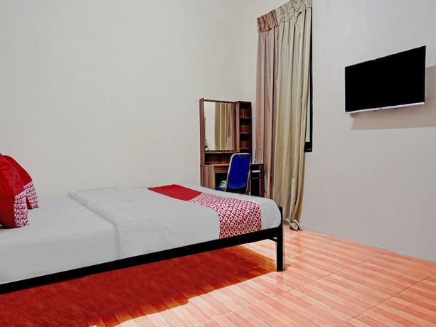 Imagen de la habitación del Hotel SUPER OYO 90689 Lily House. Foto 7