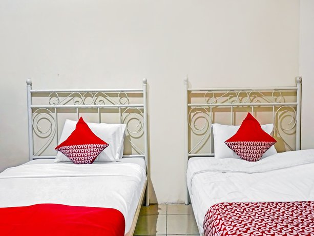 Imagen de la habitación del Hotel SUPER OYO 90689 Lily House. Foto 9
