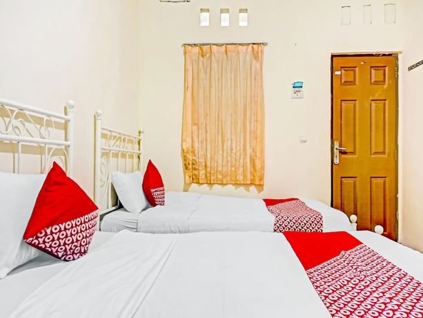 Imagen de la habitación del Hotel SUPER OYO 90689 Lily House. Foto 11