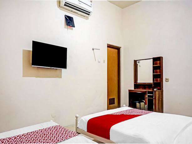Imagen de la habitación del Hotel SUPER OYO 90689 Lily House. Foto 12