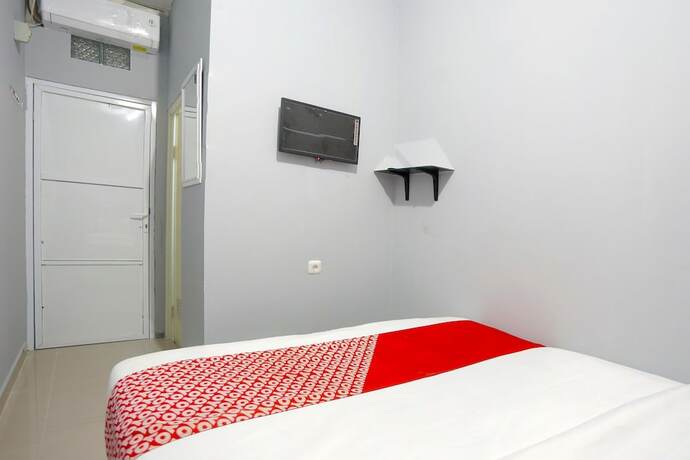 Imagen de la habitación del Hotel SUPER OYO 90848 Jandb Rooms Bekasi. Foto 19