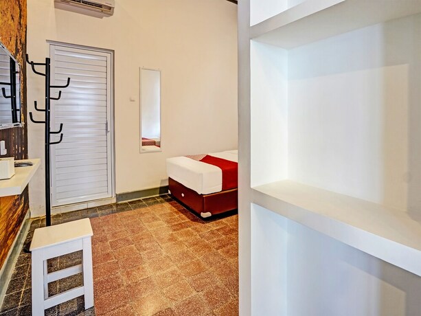 Imagen de la habitación del Hotel SUPER OYO 91618 Nawangwulan. Foto 18
