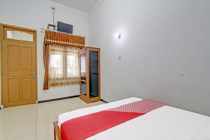 Imagen de la habitación del Hotel SUPER OYO 91748 Wisma Pkpri Purworejo. Foto 16