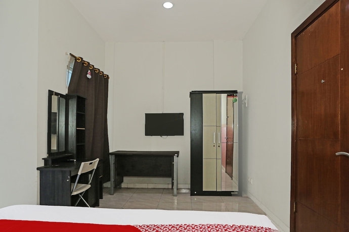 Imagen de la habitación del Hotel SUPER OYO 92003 Sky Airlines Guesthouse. Foto 9