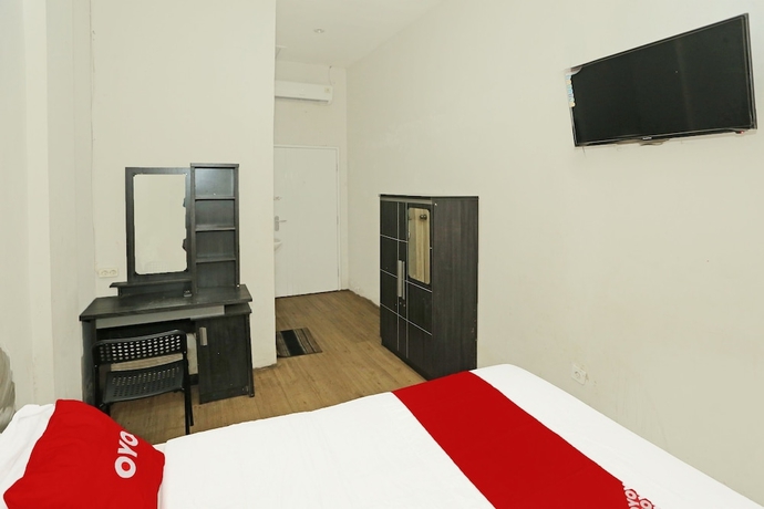 Imagen de la habitación del Hotel SUPER OYO 92003 Sky Airlines Guesthouse. Foto 11
