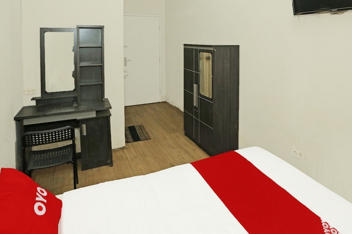 Imagen de la habitación del Hotel SUPER OYO 92003 Sky Airlines Guesthouse. Foto 13