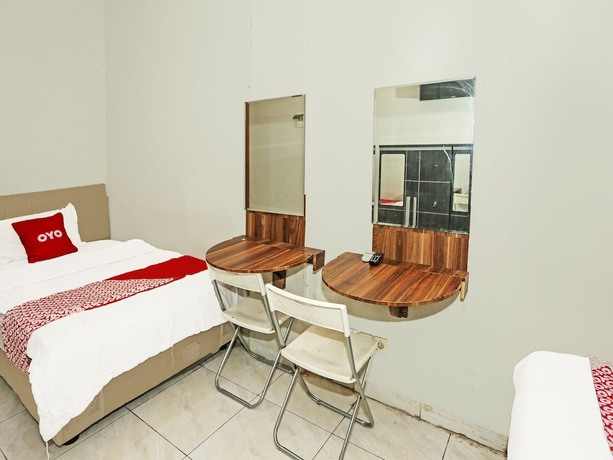 Imagen de la habitación del Hotel SUPER OYO 92003 Sky Airlines Guesthouse. Foto 14