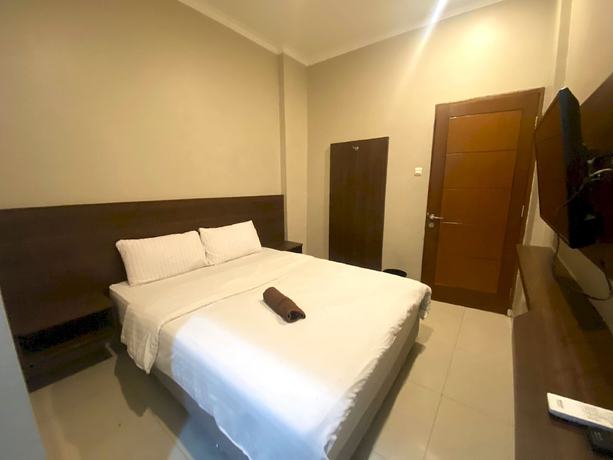Imagen de la habitación del Hotel SUPER OYO 93287 Pioneer Pasar Baru. Foto 3