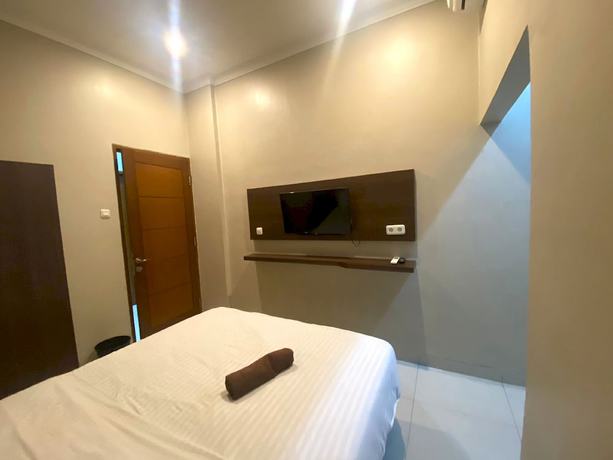 Imagen de la habitación del Hotel SUPER OYO 93287 Pioneer Pasar Baru. Foto 5