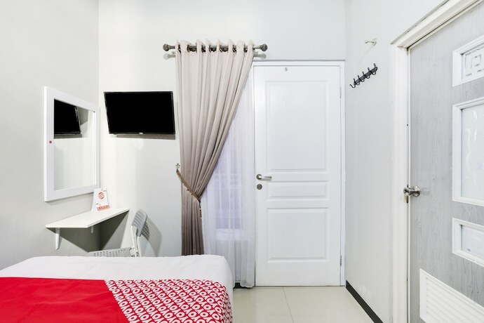 Imagen de la habitación del Hotel SUPER OYO Capital O 3971 Griya Loka Syariah 1 Sampangan. Foto 14