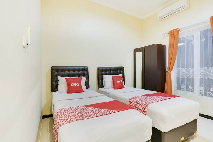 Imagen de la habitación del Hotel SUPER OYO Capital O 3971 Griya Loka Syariah 1 Sampangan. Foto 17