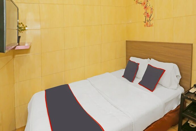 Imagen de la habitación del Hotel SUPER OYO Capital O 92676 Sion Holiday. Foto 15