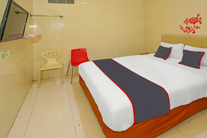 Imagen de la habitación del Hotel SUPER OYO Capital O 92676 Sion Holiday. Foto 16