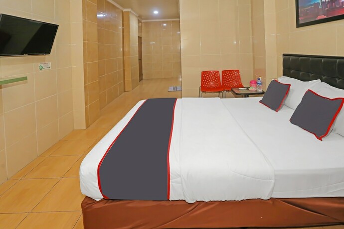 Imagen de la habitación del Hotel SUPER OYO Capital O 92676 Sion Holiday. Foto 18