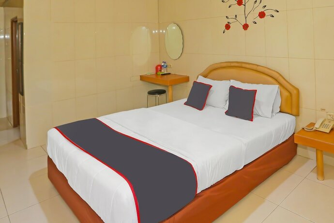 Imagen de la habitación del Hotel SUPER OYO Capital O 92676 Sion Holiday. Foto 19